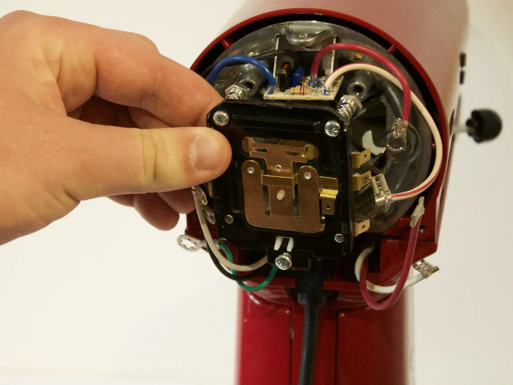 The speed controller board of a KitchenAid stand mixer being replaced